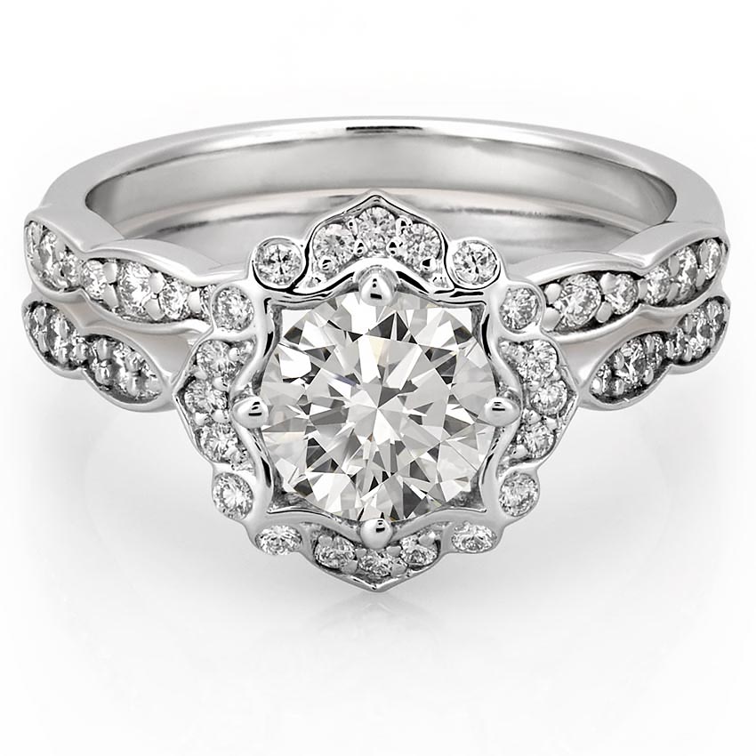 affordable-white-gold-floral-halo-engagement-ring-set-with-round-hearts-and-arrows-moissanite