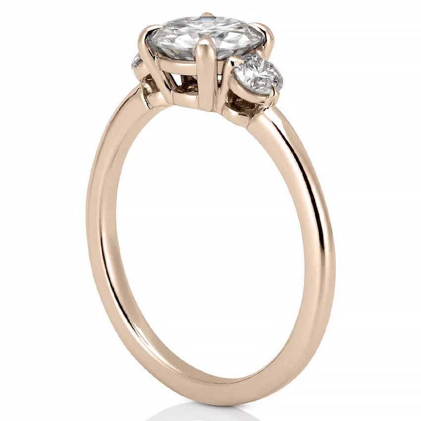 engagement-ring-with-three-stones-rose-gold