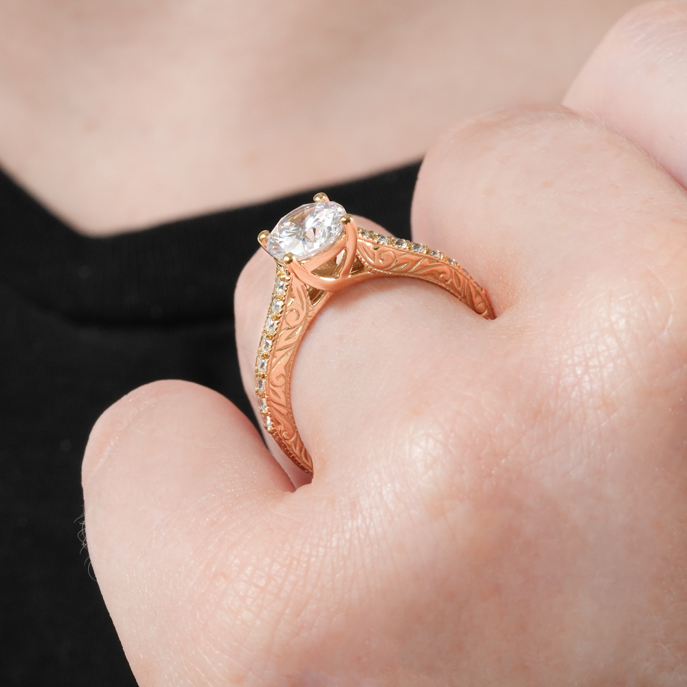 Angle view of engraved engagement ring in lifestyle