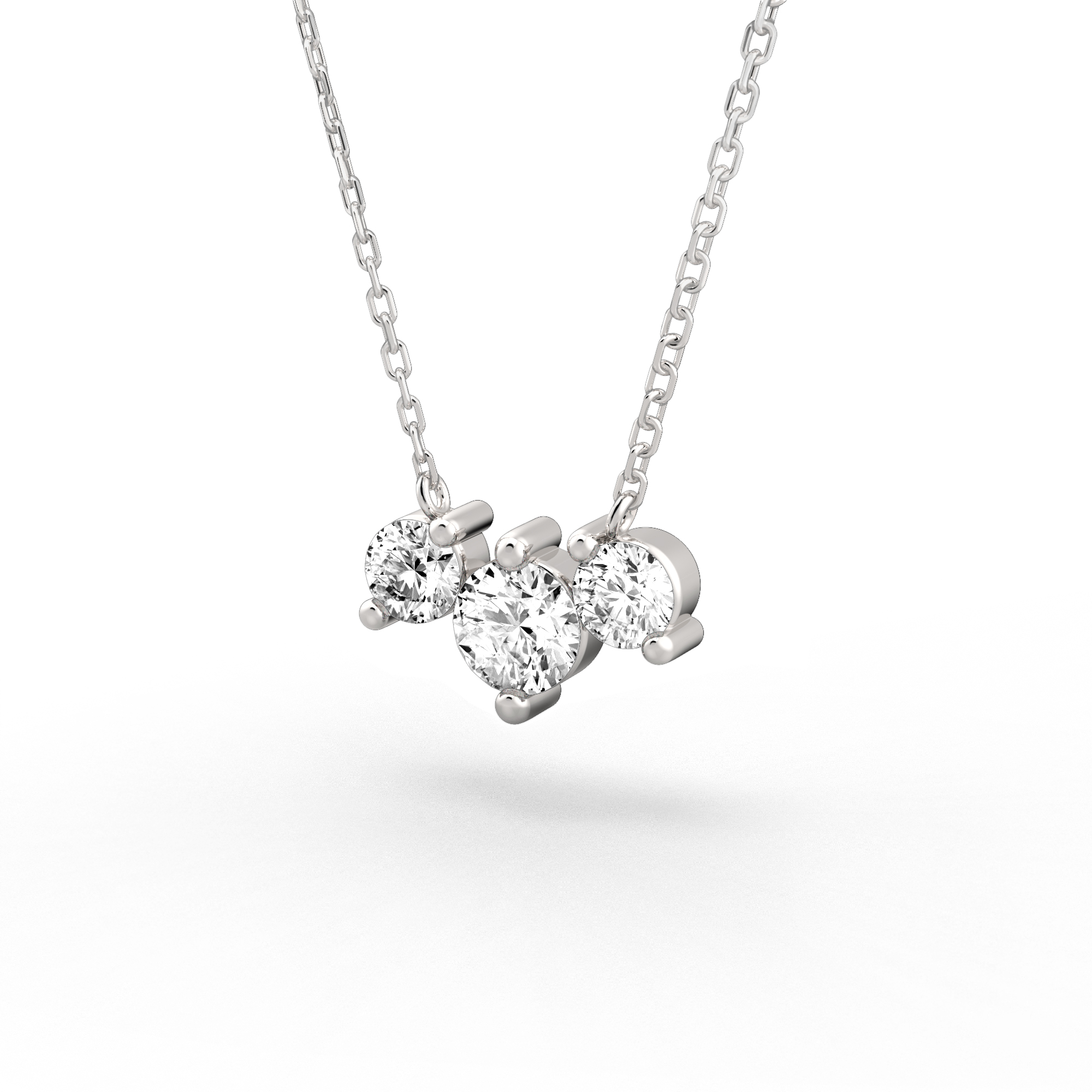 Angle view of lab diamond three stone necklace in platinum