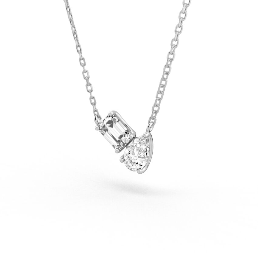 Angle view of lab diamond toi et moi necklace in platinum