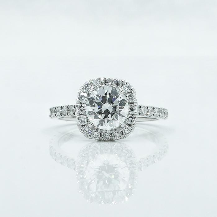 round-diamond-cushion-halo-engagement-ring