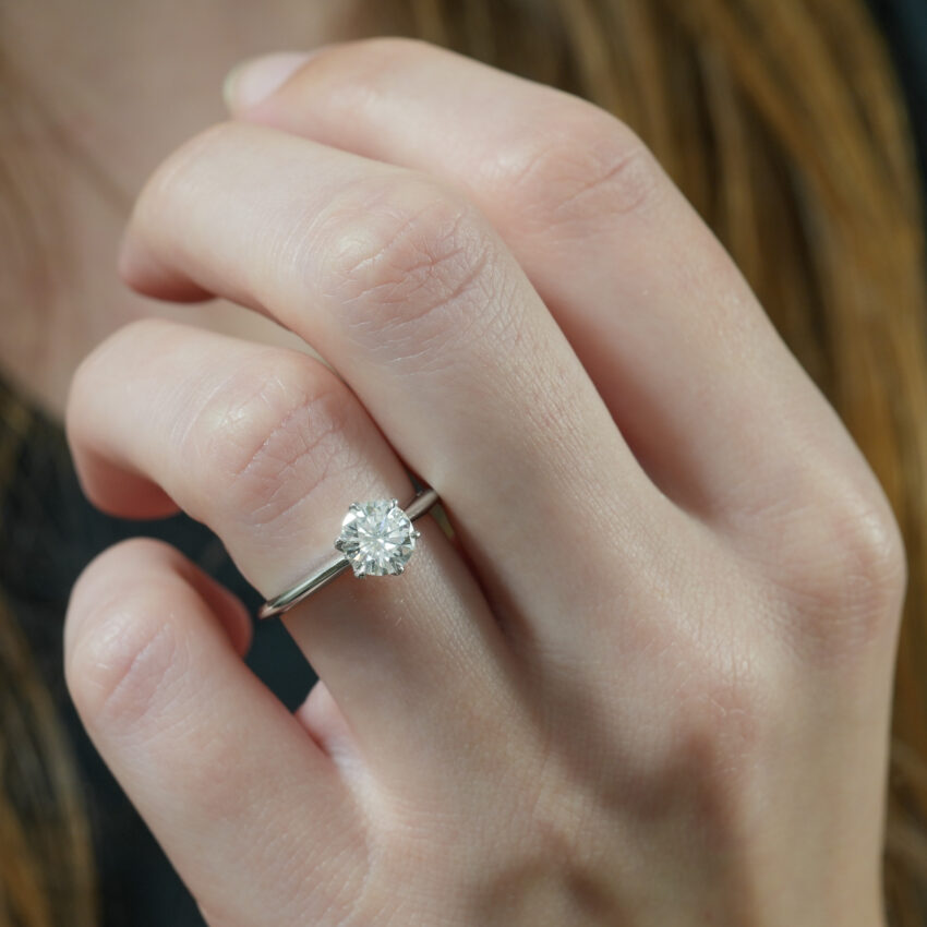 six prong engagement ring in lifestyle