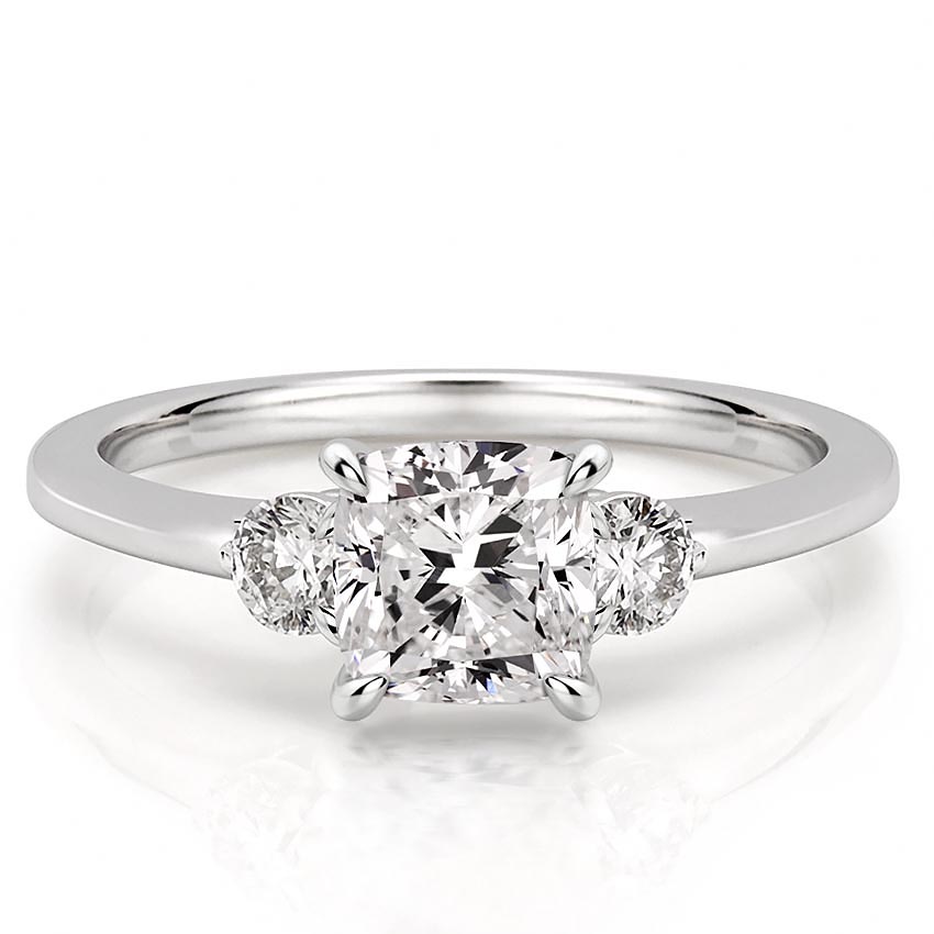 three-stone-cushion-engagement-ring in platinum
