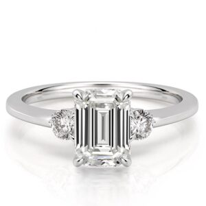 three-stone-emerald-engagement-ring in white gold