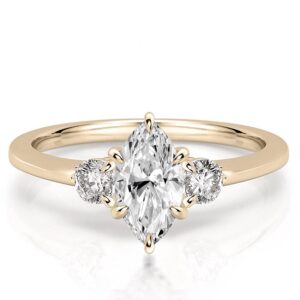 three-stone-marquise-engagement-ring in yellow gold