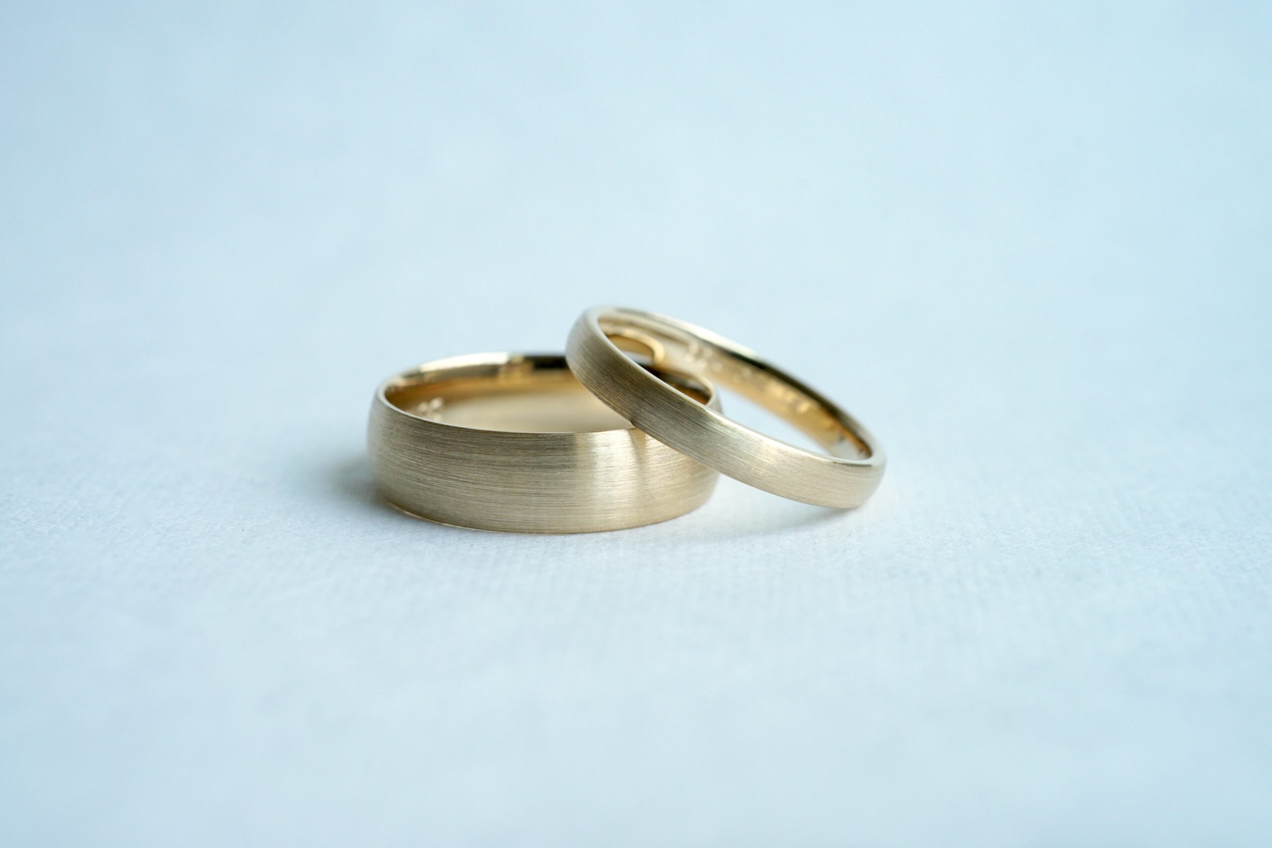 Satin finish men's wedding bands comparison of 2mm and 4mm