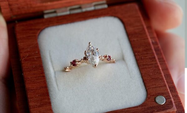 Custom-8×4-mm-Marquise-Moissanite-with-Delicate-Band-and-Small-Rubies-Rose-Gold