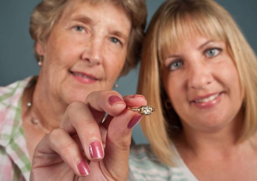 Mother and daughter with engagement ring