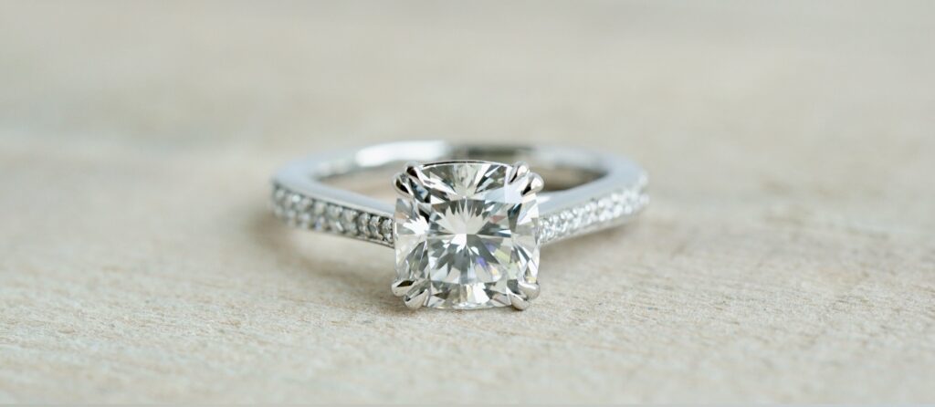 cushion engagement ring with double claw prongs