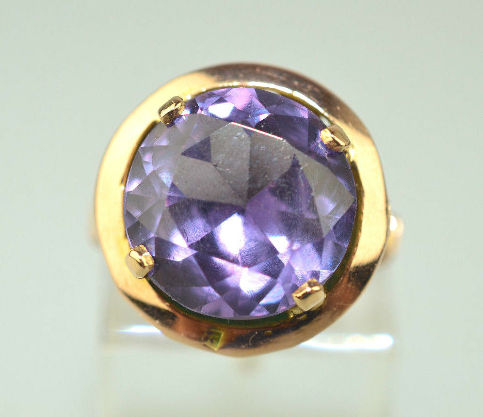 alexandrite engagement ring simulant in yellow gold