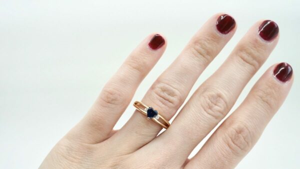 cropped-Unity-5mm-Heart-Lab-Blue-Sapphire-YG-Hand