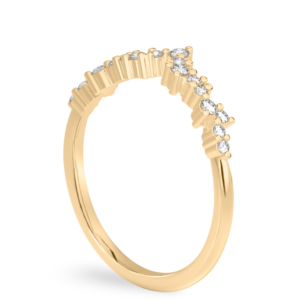 yellow gold scattered diamond chevron band from an angle view