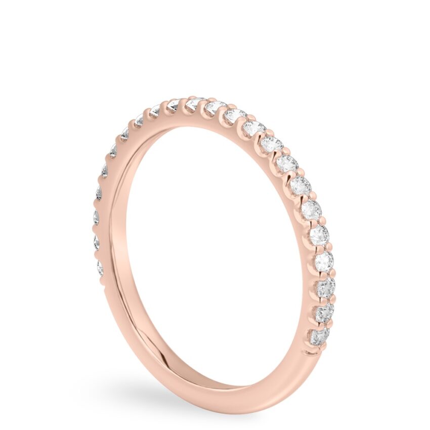 rose gold wedding band with round diamonds and shared prongs