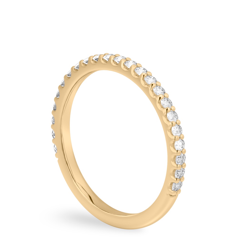 yellow gold wedding band with round diamonds and shared prongs
