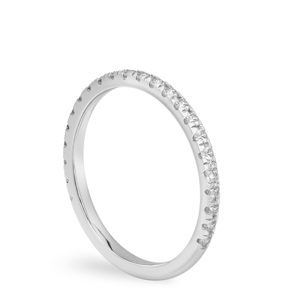 angle view of wedding band in white gold with french pave diamonds