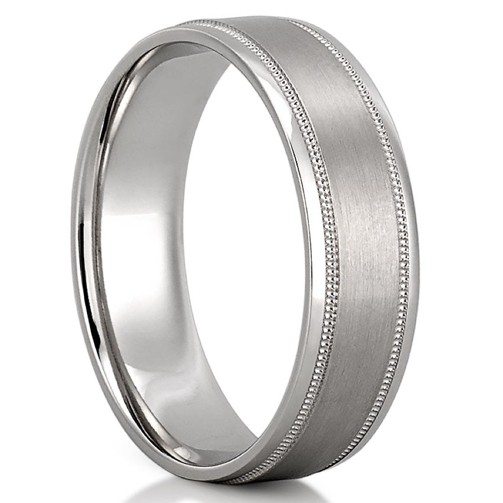 angle view of white gold men's wedding band with satin finish and milgrain detail