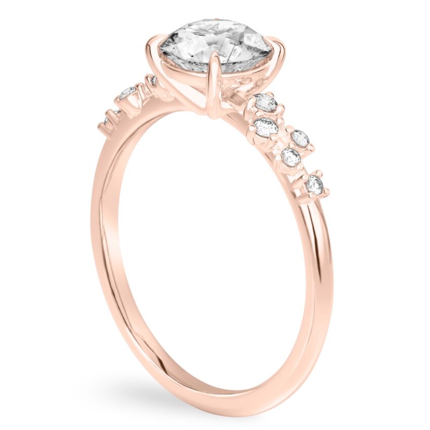 basket engagement ring with scatterd side diamonds rose gold