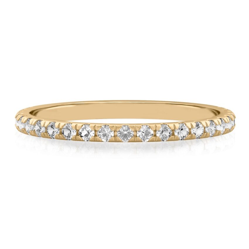 wedding band with french pave diamonds in yellow gold