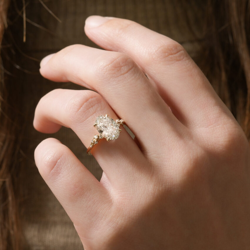 scattered diamond oval ring yellow gold lifestyle video cover