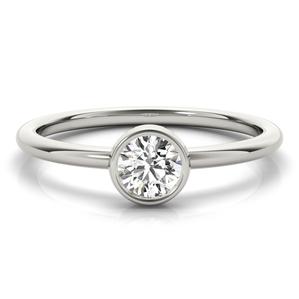 ring with round bezel and lab created diamond in white gold