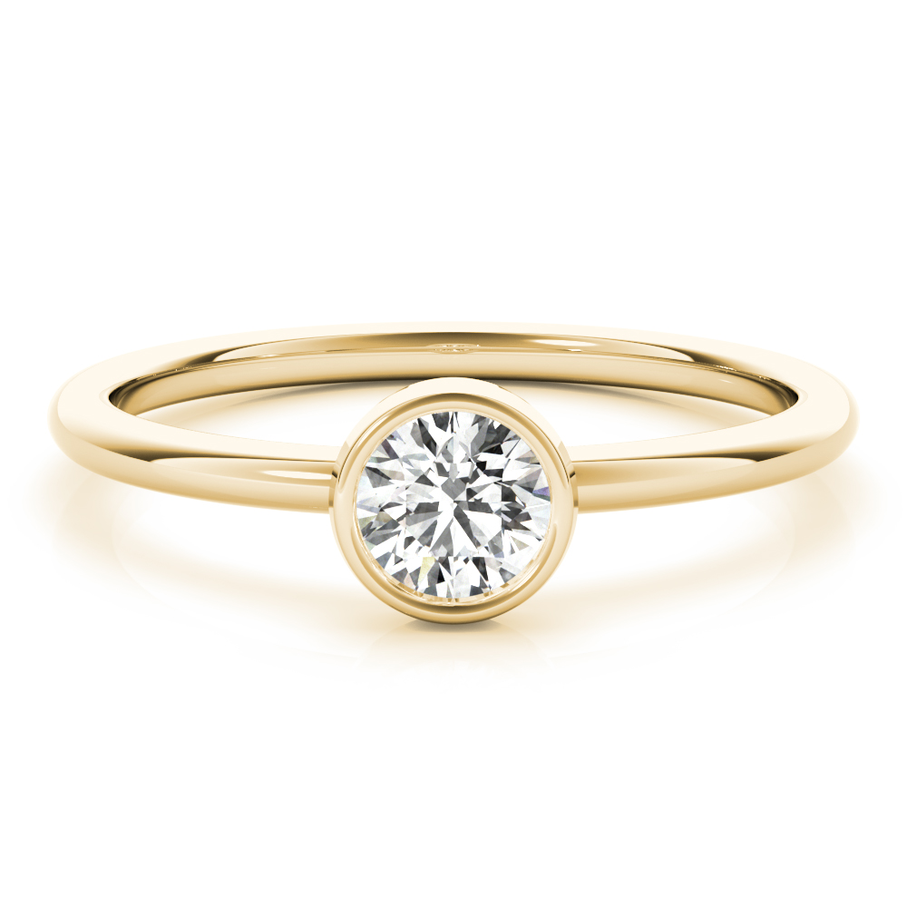 ring with round bezel and lab created diamond in yellow gold