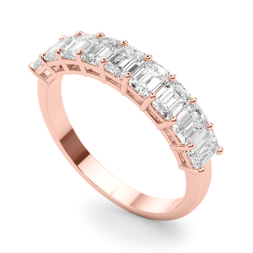 rose gold emerald lab diamond anniversary band with shared prongs
