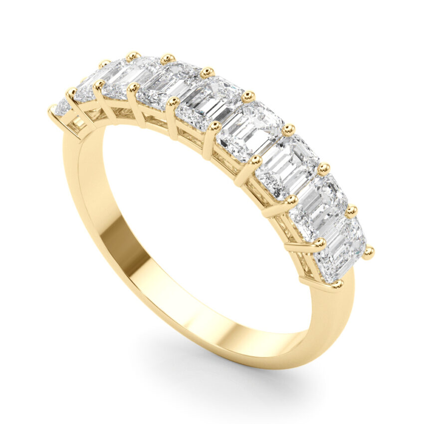 yellow gold emerald lab diamond anniversary band with shared prongs