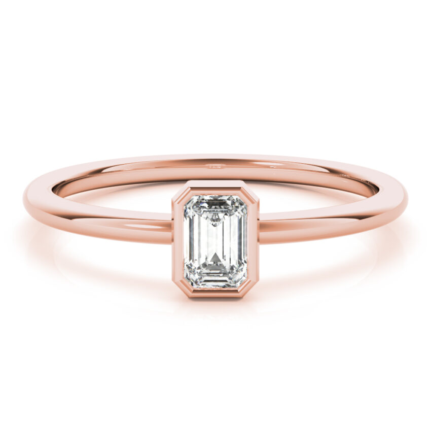 ring with emerald bezel and lab created diamond in rose gold