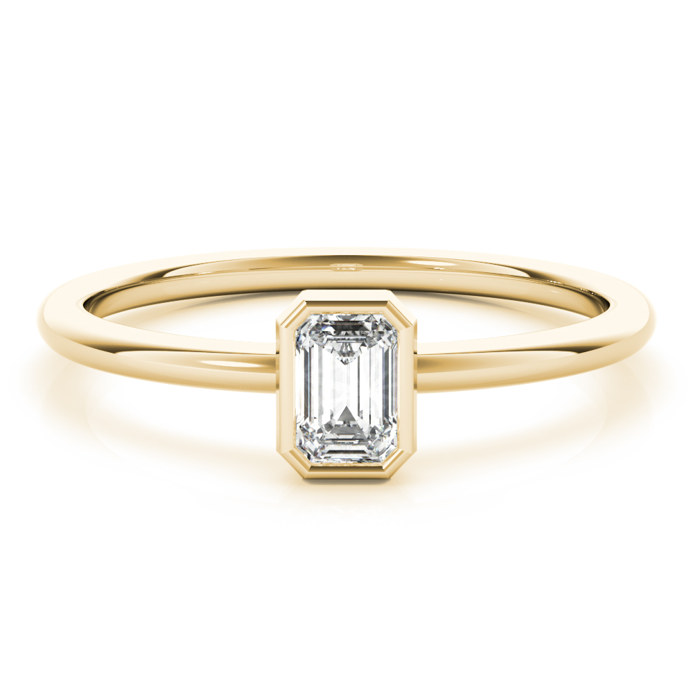 ring with emerald bezel and lab created diamond in yellow gold