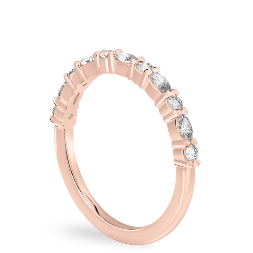 rose gold angle view of wedding band with marquise and round diamonds