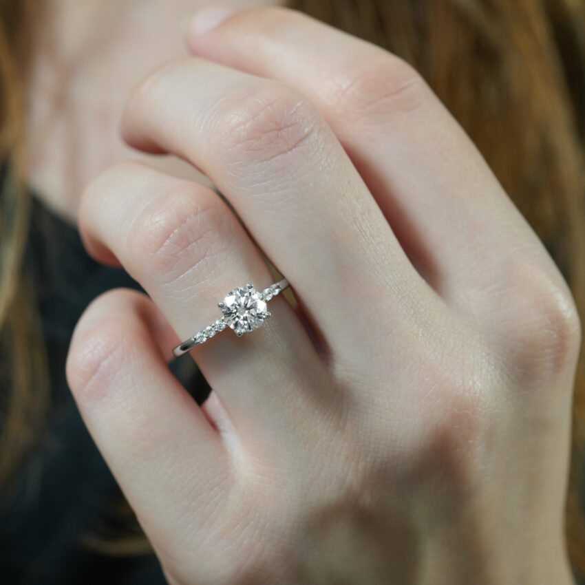 Video of minimalist pave engagement ring in lifestyle