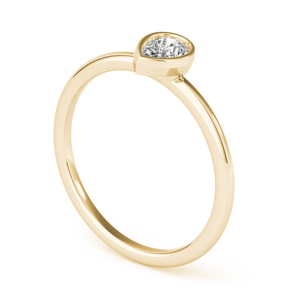 angle view of pear bezel stackable rings yellow gold