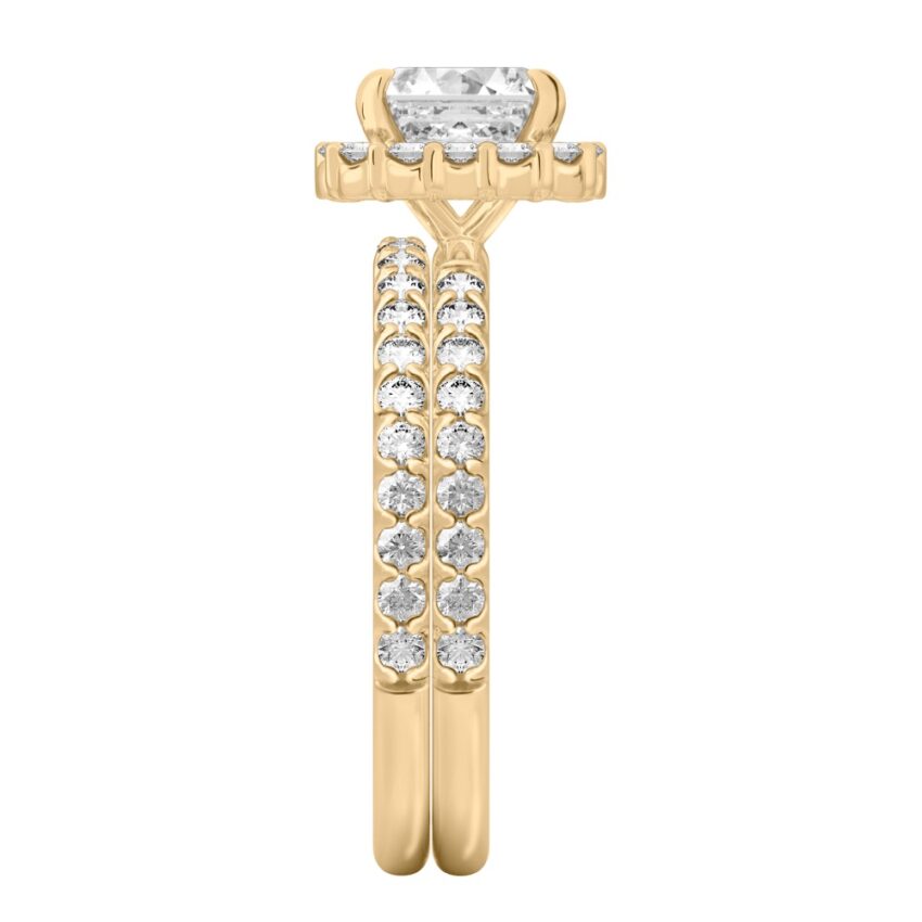 Side view of asscher cut diamond scalloped halo engagement ring set yellow gold