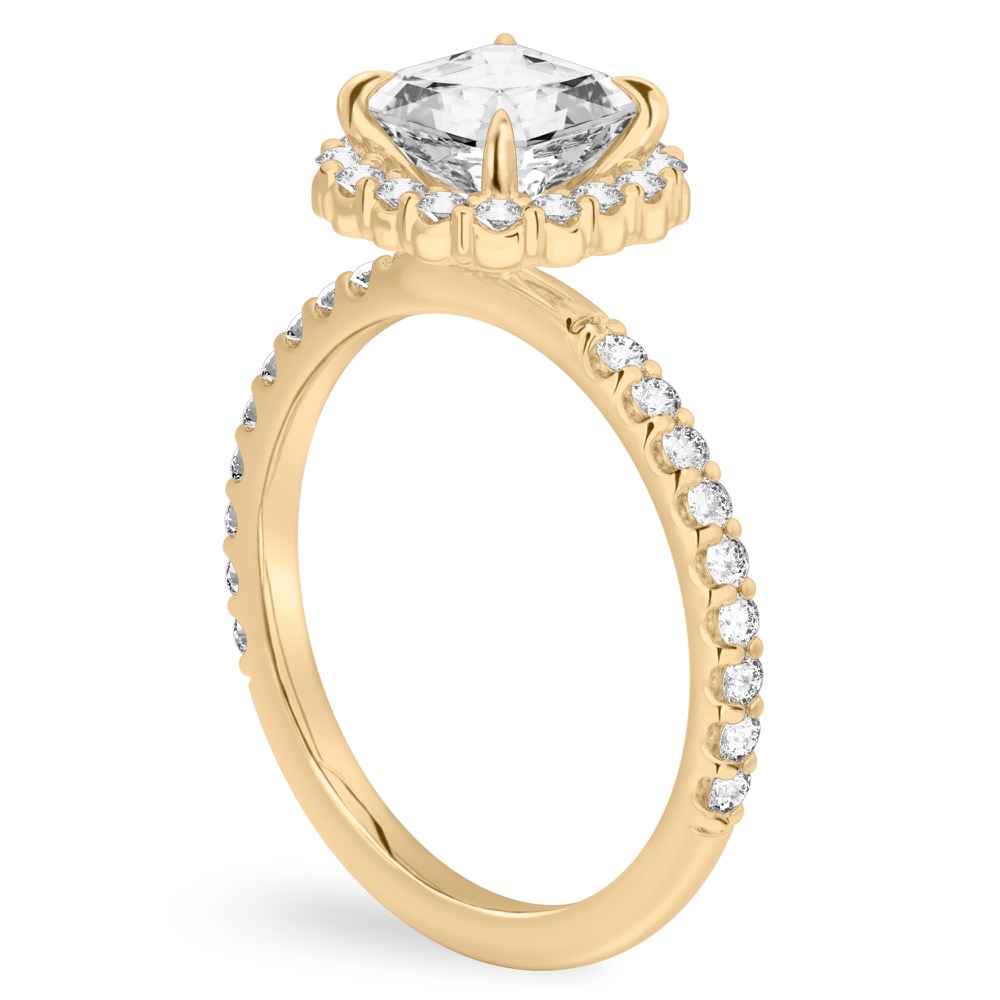 Angle view of asscher cut diamond scalloped halo engagement ring yellow gold