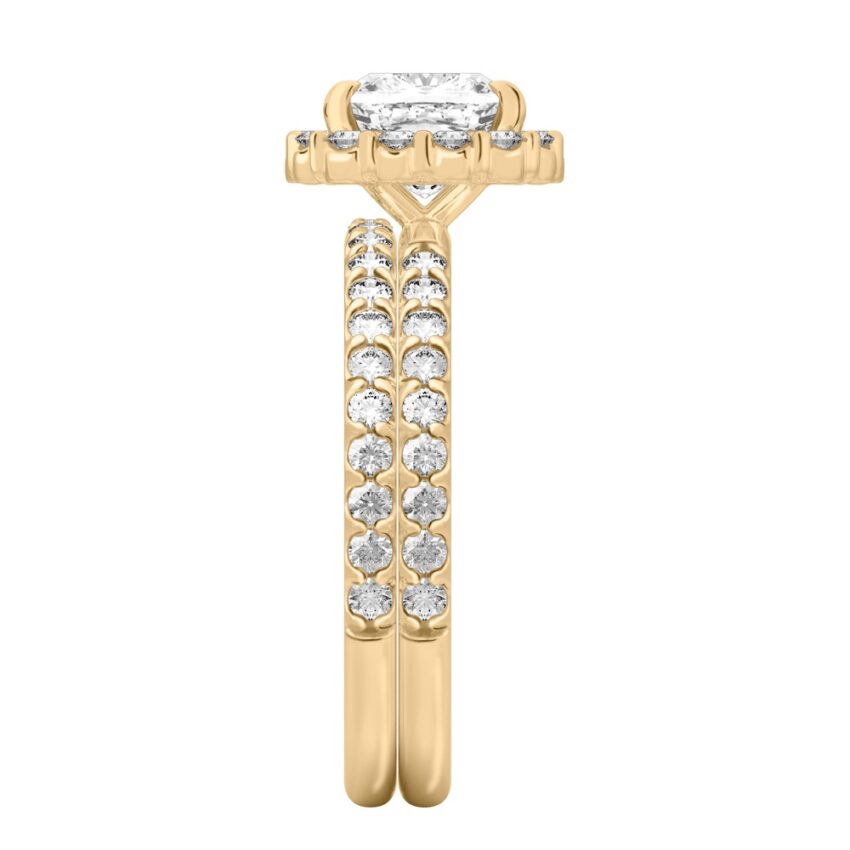 Side view of cushion cut diamond scalloped halo engagement ring set yellow gold