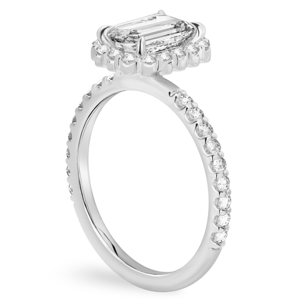 Angle view of emerald cut diamond scalloped halo engagement ring platinum