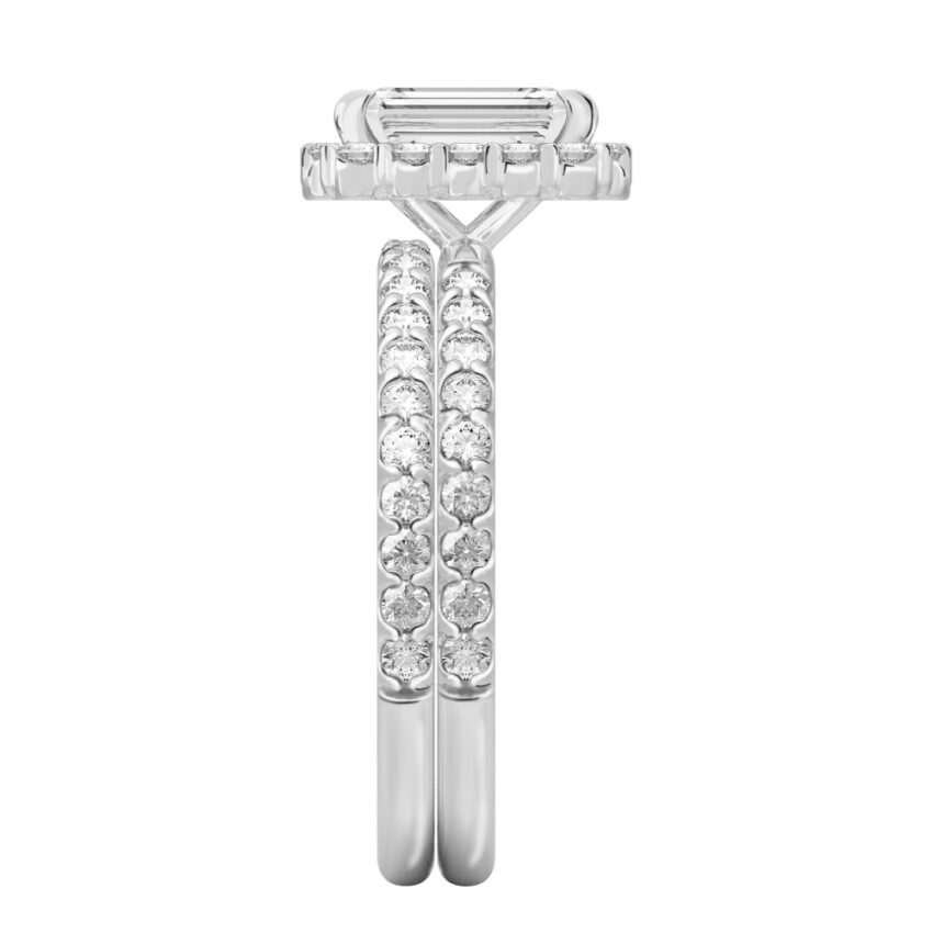 Side view of emerald cut diamond scalloped halo engagement ring set platinum