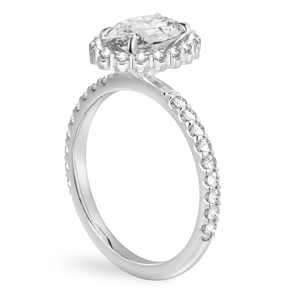 Angle view of oval shape diamond scalloped halo engagement ring platinum