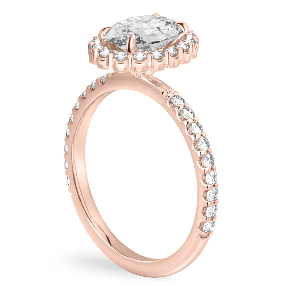 Angle view of oval shape diamond scalloped halo engagement ring rose gold