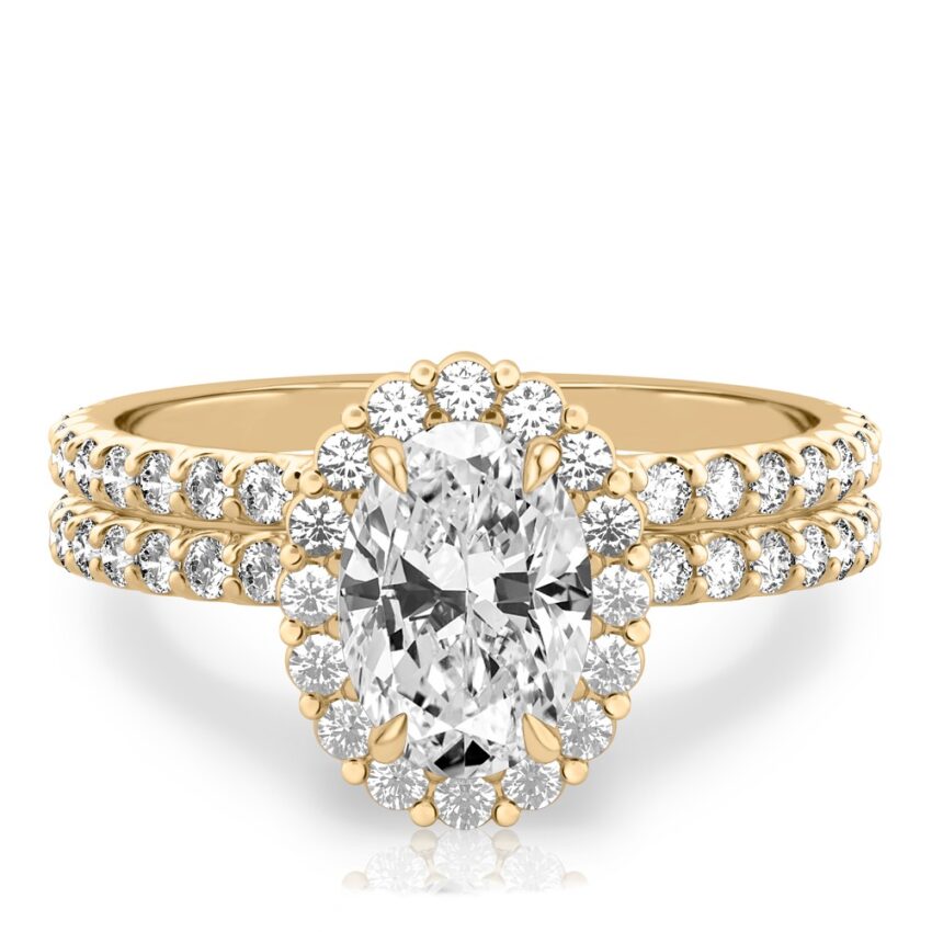 oval shape diamond scalloped halo engagement ring set in yellow gold