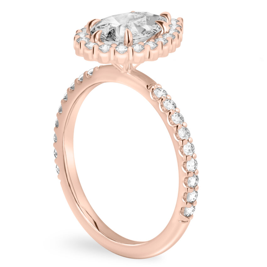 Angle view of pear shape diamond scalloped halo engagement ring rose gold