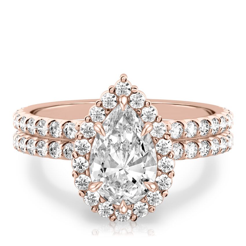 pear shape diamond scalloped halo engagement ring set in rose gold