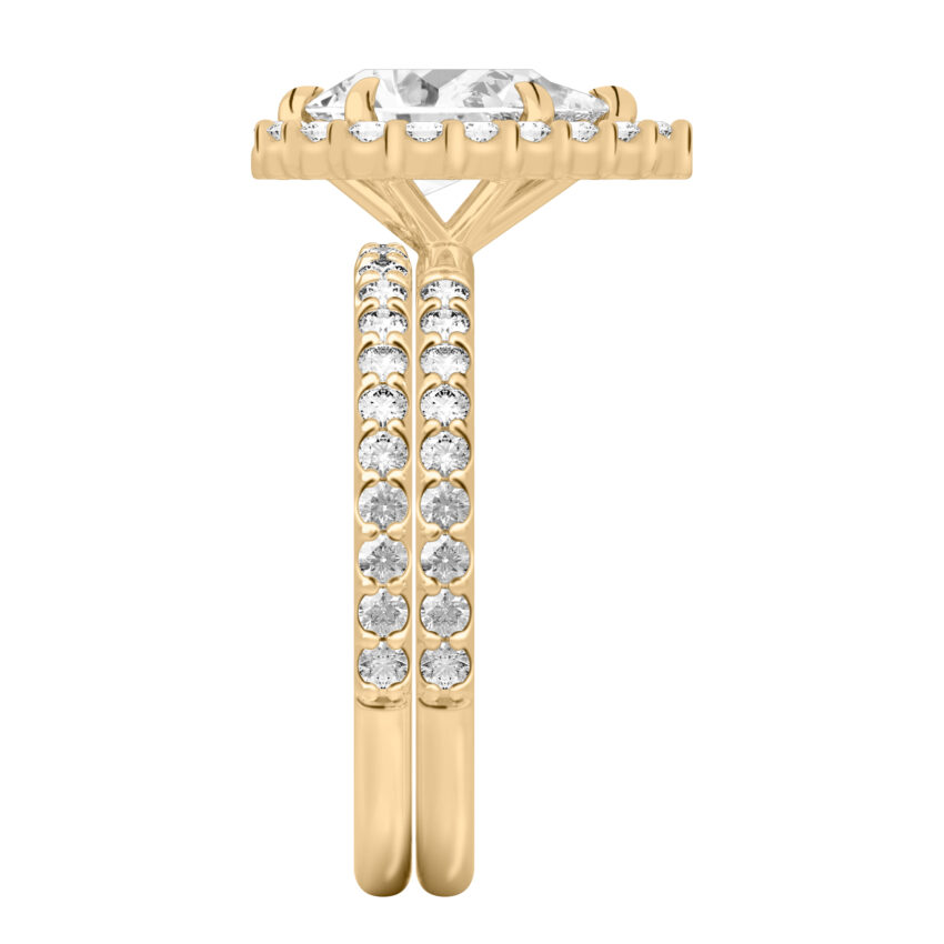 Side view of pear shape diamond scalloped halo engagement ring set yellow gold