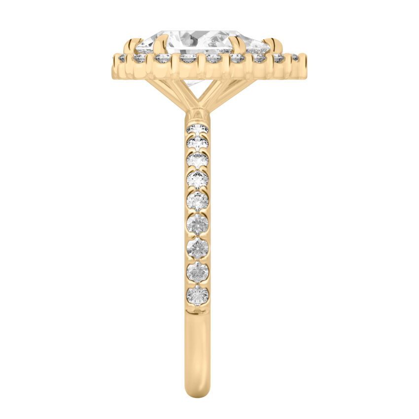 Side view of pear shape diamond scalloped halo engagement ring yellow gold