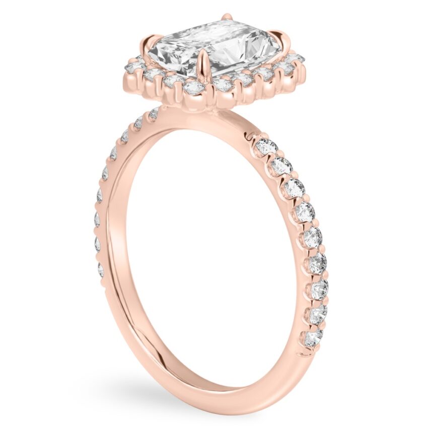 Angle view of radiant cut diamond scalloped halo engagement ring rose gold