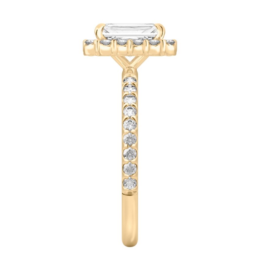 Side view of radiant cut diamond scalloped halo engagement ring yellow gold