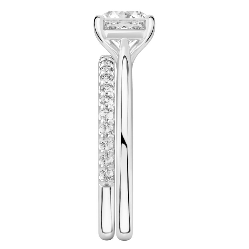 Side view of asscher cut diamond cathedral solitaire engagement ring set platinum