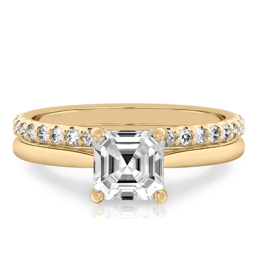 asscher cut diamond cathedral solitaire engagement ring set in yellow gold