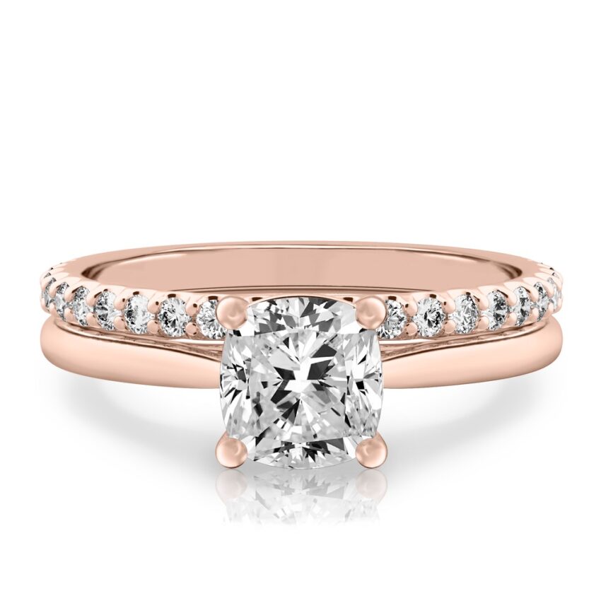 cushion cut diamond cathedral solitaire engagement ring set in rose gold